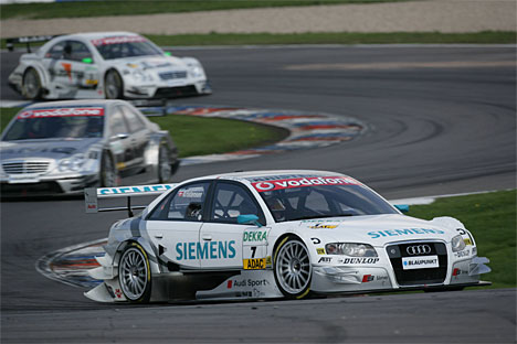 Tom Kristensen holdt blandt andre Mika Hakkinen og Polesitter Jamie Green bag sig på vej til andenpladsen i DTM-løbet på Lausitzring.